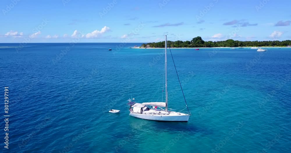 Tourist Luxury Yacht With Green Island and Cloudy Blue Sky in Miami - Close-up Aerial shot Tourist Luxury Yacht With Green Island and Cloudy Blue Sky in Miami - Close-up Aerial shot
