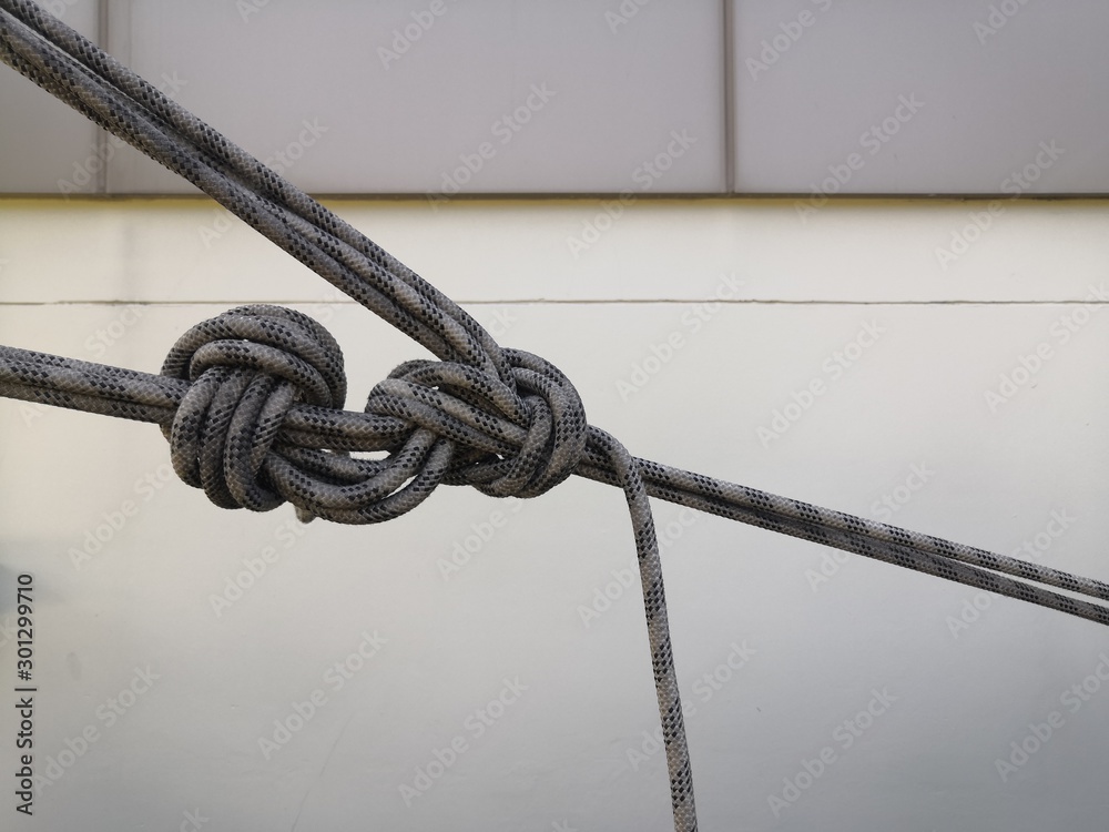Rope access for worker wearing safety harness hard hat working at ...