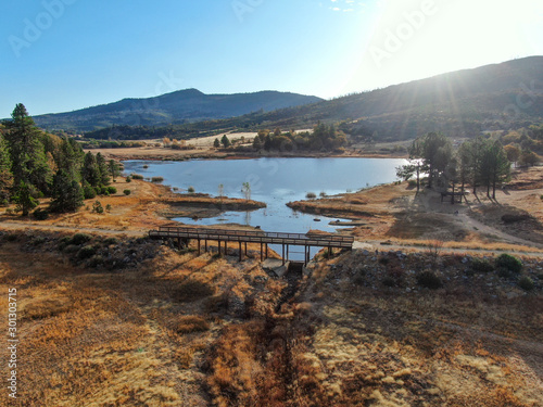 Aerial view of Lake Cuyamaca, 110 acres reservoir and a recreation area in the eastern Cuyamaca Mountains, located in eastern San Diego County, California, USA photo