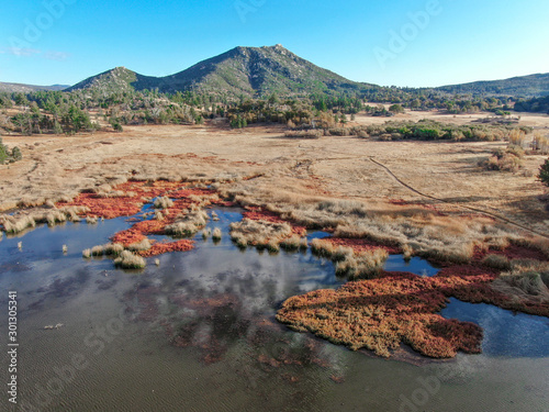 Aerial view of Lake Cuyamaca, 110 acres reservoir and a recreation area in the eastern Cuyamaca Mountains, located in eastern San Diego County, California, USA photo