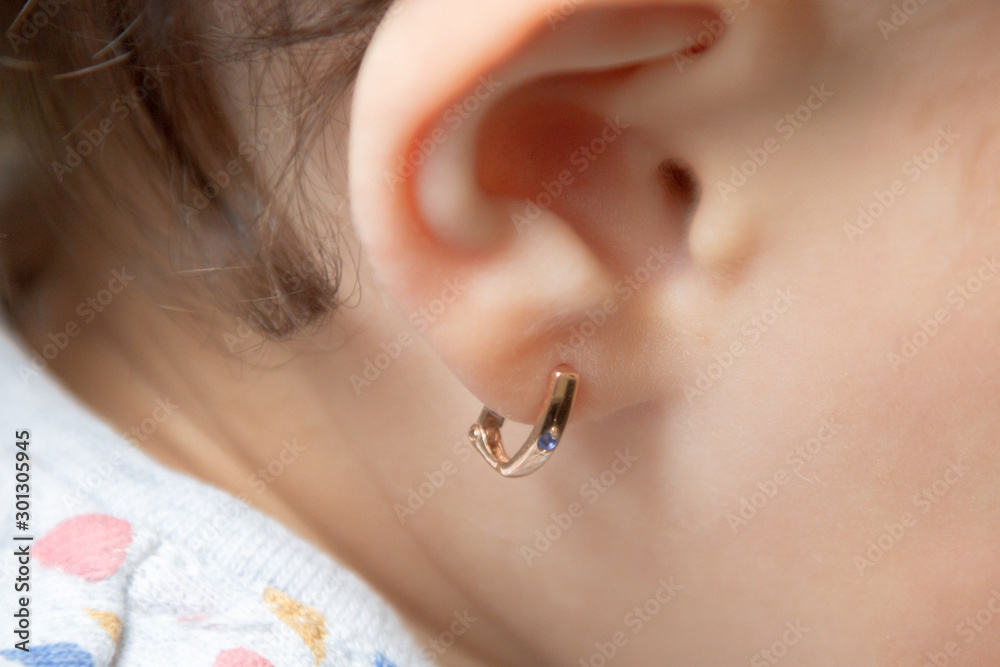 the puncture of ears to children is younger than three years