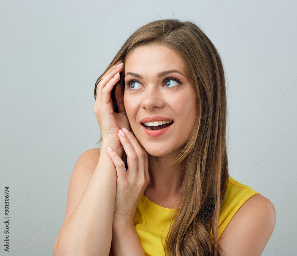 face portrait of young woman with long hair looking at side. face portrait of young woman with long hair looking at side.