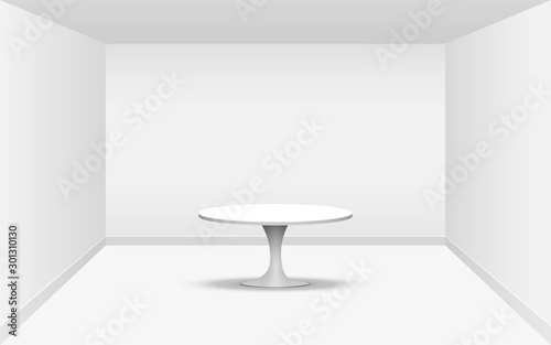 white round table in the white studio room