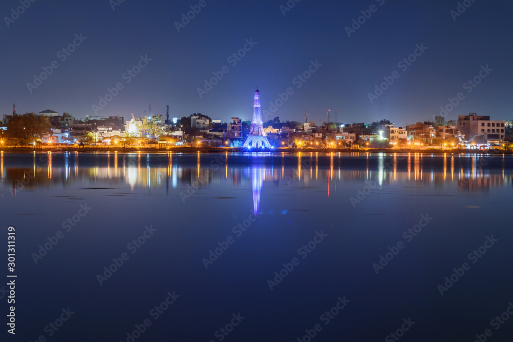 Seven Wonders Park on Kishore Sagar lake at night. Kota. India