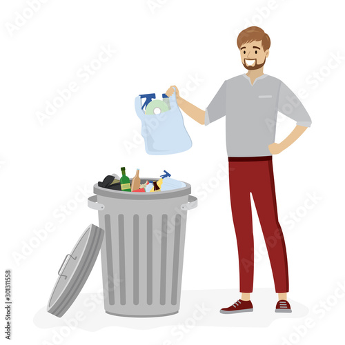 Open metal trash can with garbage.Young man throws a bag with garbage.