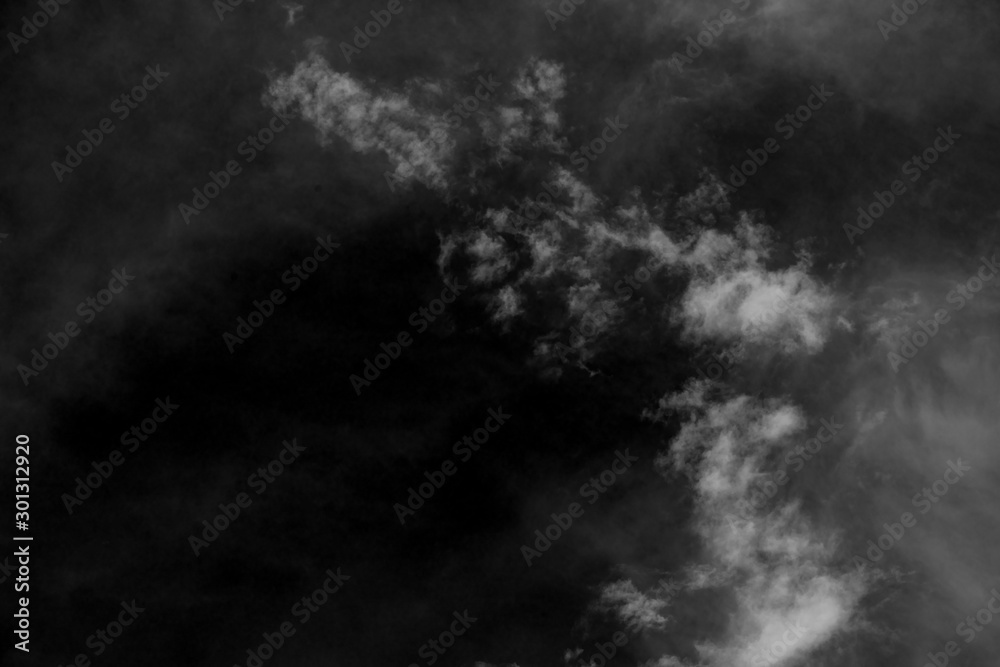 Obraz premium white cloud and black sky textured background