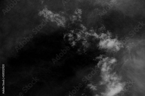 white cloud and black sky textured background