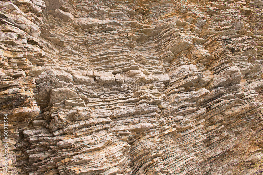 The background texture of the rock. Conceptual background for the design. Selective focus. The background texture of the rock. Conceptual background for the design. Selective focus.