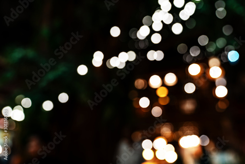 White bokeh background of Christmas lights and New year