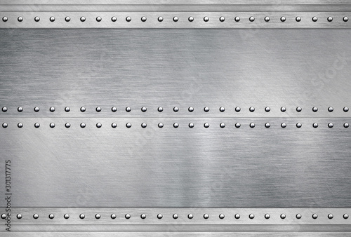 Shiny metallic steel plate with rivets