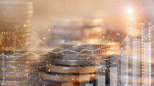 Financial investment concept, Double exposure of city night and stack of coins for finance investor, Forex trading candlestick chart, Cryptocurrency Digital economy. 