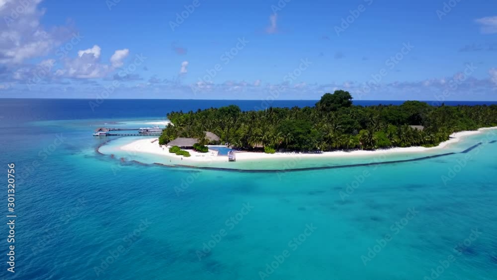 Aerial View of Expensive Island Resort Surrounded By Blue Clean Water and Exotic White Sand in Bahamas Aerial View of Expensive Island Resort Surrounded By Blue Clean Water and Exotic White Sand in Bahamas