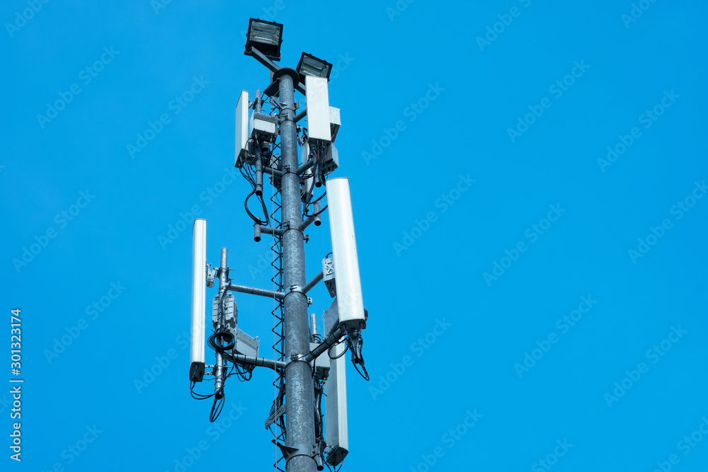 communication antenna tower with blue sky,Telecoms technology communication antenna tower with blue sky,Telecoms technology