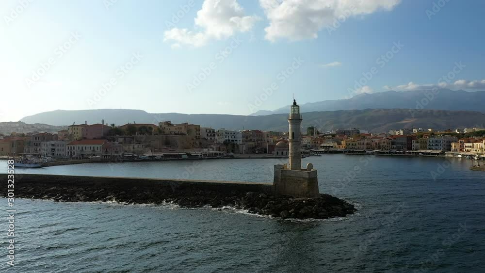 Aerial view of lighthouse of Chania city, Crete, Greece. Lighthouse of Chania at summer sunset. Travel background Aerial view of lighthouse of Chania city, Crete, Greece. Lighthouse of Chania at summer sunset. Travel background