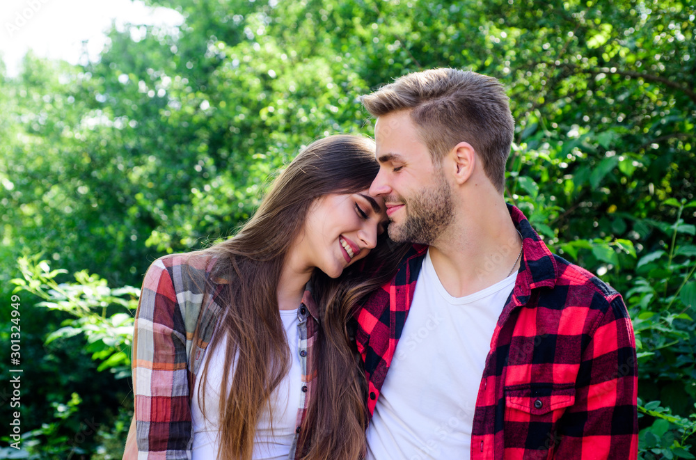 Man hipster and pretty woman in love. Summer vacation. Fall in love. Pure feelings. Romantic date concept. Beautiful people. Happy together. Couple in love. Enjoying each other. Cuddling with darling Man hipster and pretty woman in love. Summer vacation. Fall in love. Pure feelings. Romantic date concept. Beautiful people. Happy together. Couple in love. Enjoying each other. Cuddling with darling
