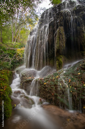 Fototapeta Naklejka Na Ścianę i Meble -  river with waterfall in the autumn season