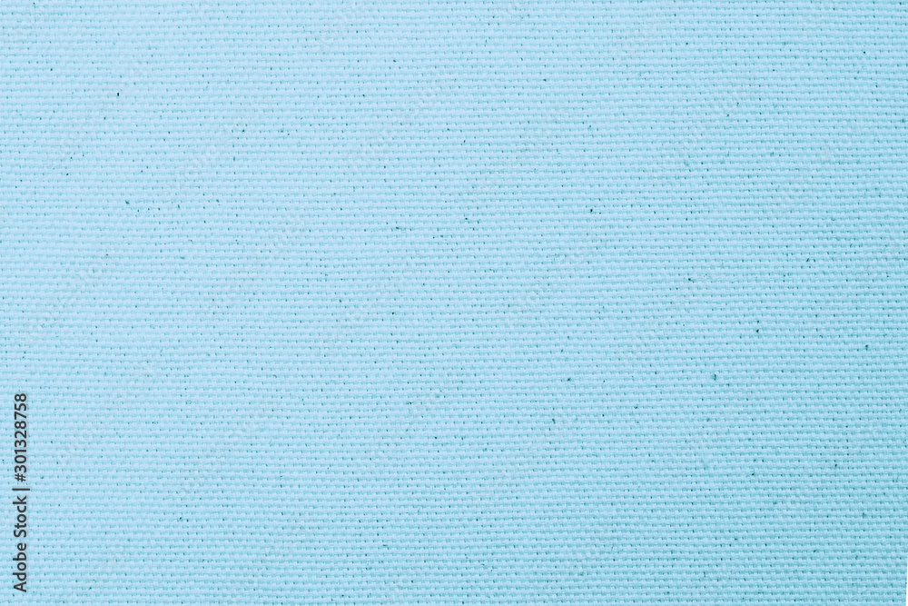 Hessian sackcloth woven texture pattern background in bleached light blue pastel color Hessian sackcloth woven texture pattern background in bleached light blue pastel color