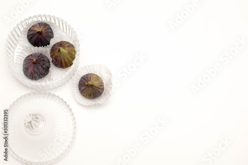 Decorative figs over a white background. Flatley