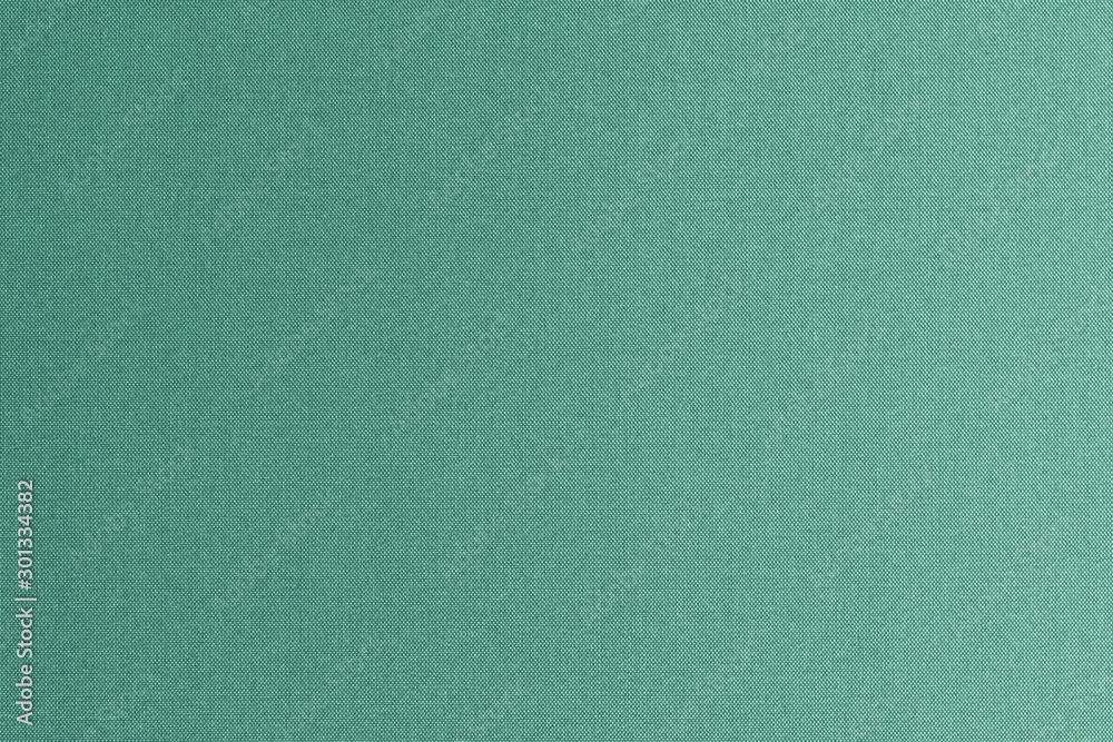 Cotton silk fabric wallpaper texture pattern background in light pastel nature green lime yellow color tone