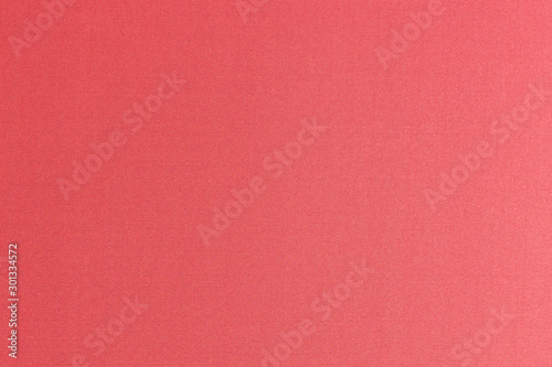 Fine authentic silk fabric wallpaper texture pattern background in vivid shiny striking red color