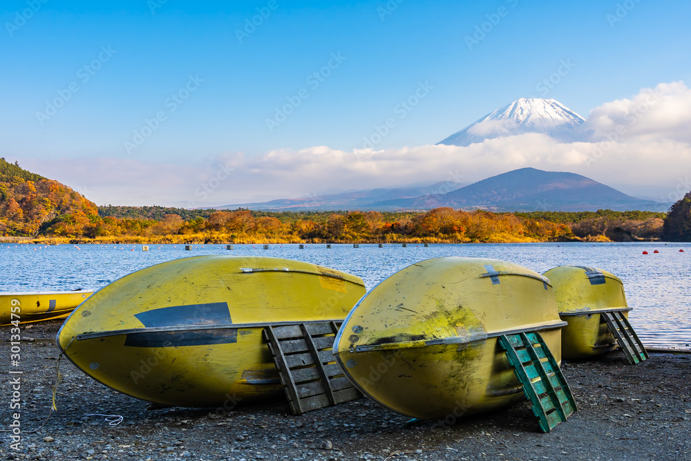 Beautiful landscape of mountain fuji with maple leaf tree around lake Beautiful landscape of mountain fuji with maple leaf tree around lake