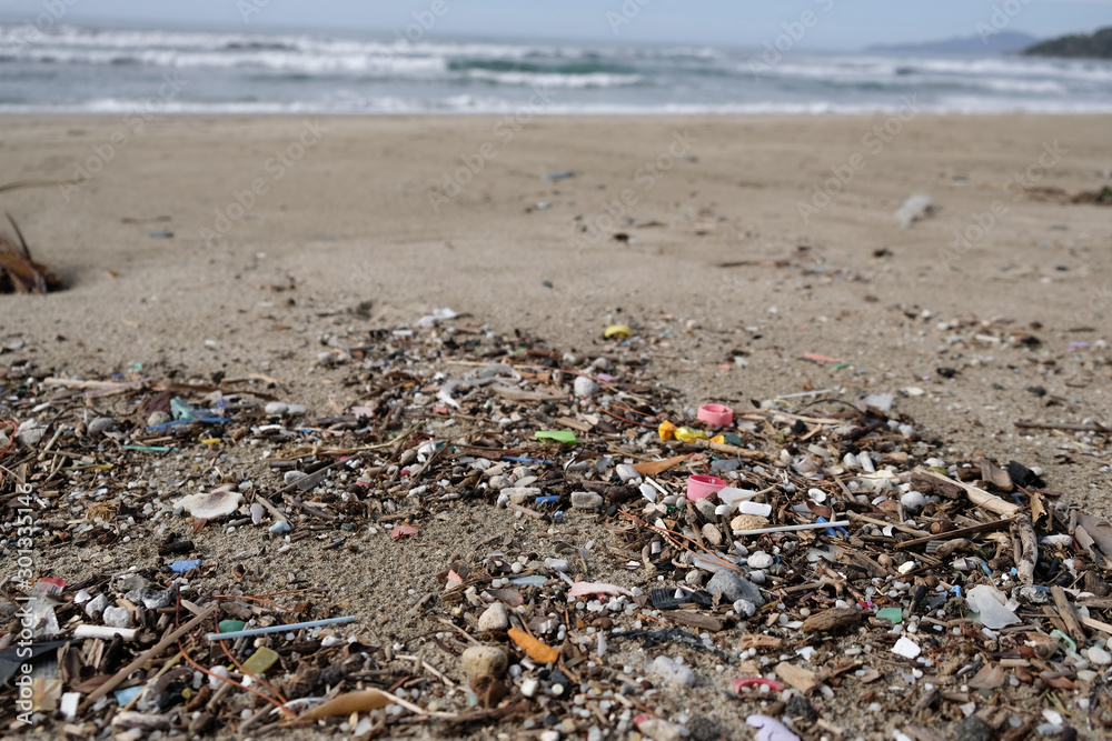 Micro plastic sea coast pollution, plastics free ecosystem planet save concept