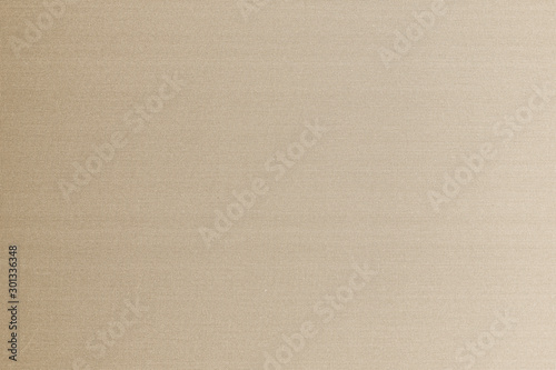Cotton silk fabric wallpaper texture pattern background in light pastel sepia tan cream brown color tone