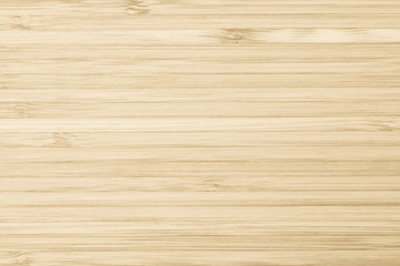 Bamboo wood texture background in natural light yellow brown color .