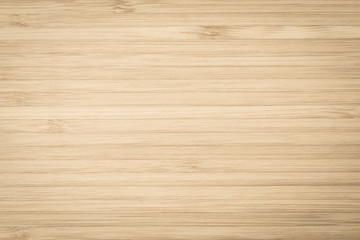 Bamboo wood texture background in natural light yellow brown color .