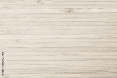 Bamboo wood texture background in cream tan sepia brown.