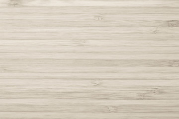 Bamboo wood texture background in cream tan sepia brown.