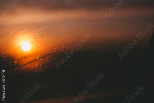 A beautiful sunset that can be seen through the dew window
