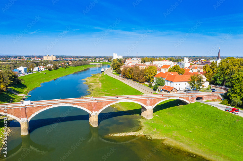 Croatia, town of Sisak, aerial view from drone of the old town center and bridge over Kupa river