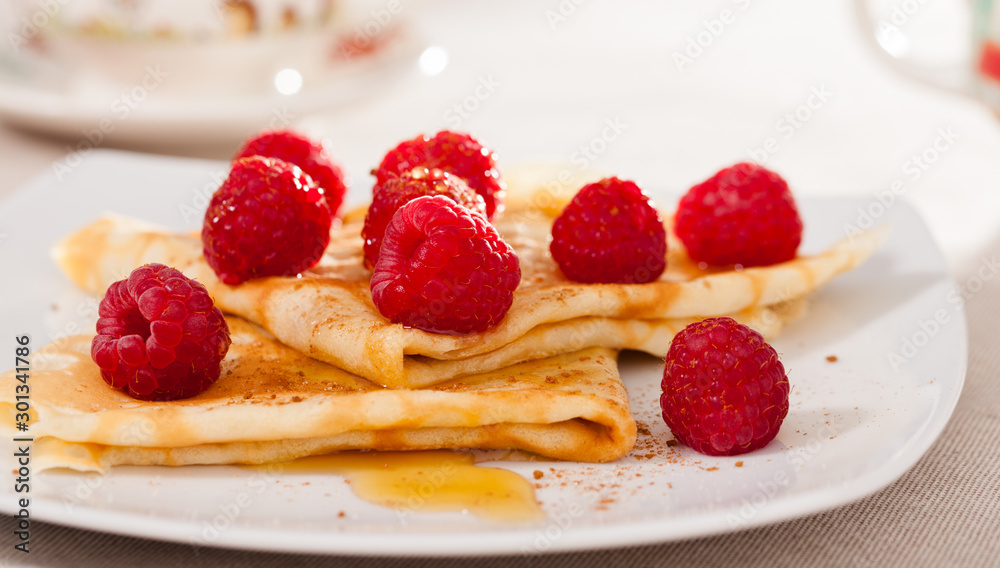 delicious pancakes with fresh raspberries and honey delicious pancakes with fresh raspberries and honey