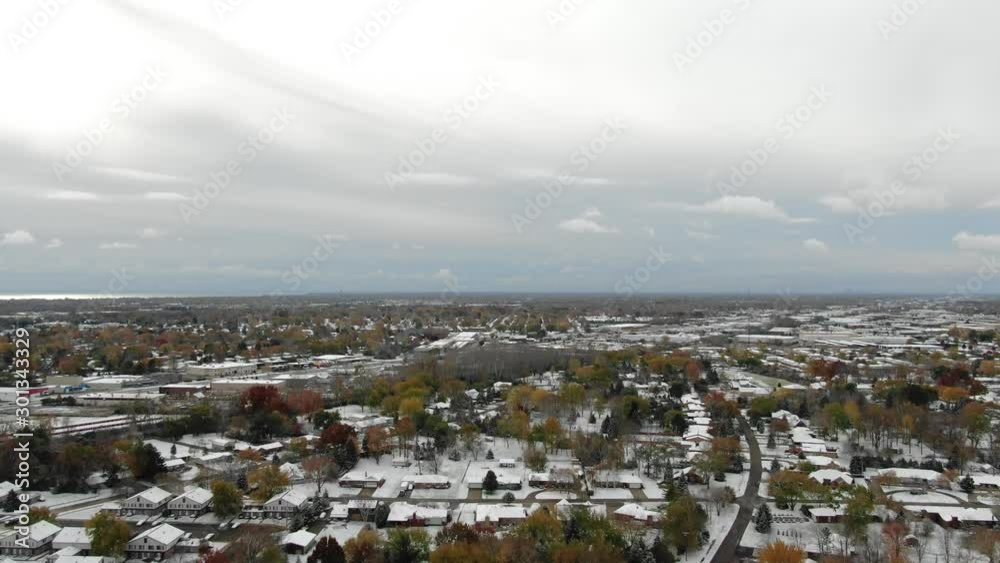 USA Michigan Clinton Township DJI Mavic flying over Farmbrooke Drive on a snowy winter morning USA Michigan Clinton Township DJI Mavic flying over Farmbrooke Drive on a snowy winter morning