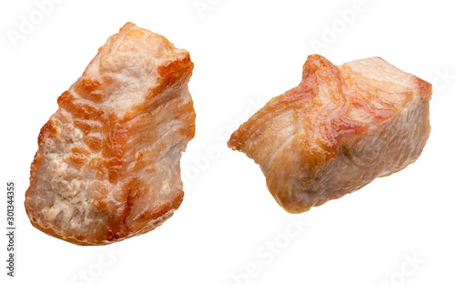 Pieces (in the form of dice) of cooked turkey (chicken) (grilled). Isolated on white background.