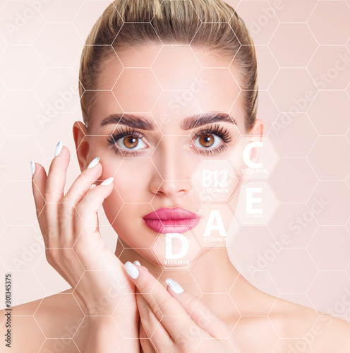 Young woman in honeycombs with graphic icons of vitamins for skin health.