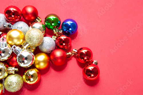 Colorful christmas balls collection on red background