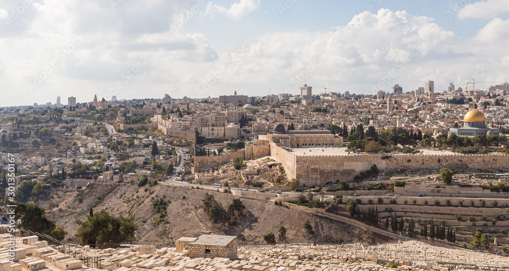 Panoramic view of the Jewish cemetery, the Temple Mount, the old and modern city of Jerusalem from Mount Eleon - Mount of Olives in East Jerusalem in Israel