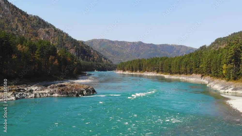 Beautiful view of the mountain river in the mountains and forests of Altai. Aerial view Beautiful view of the mountain river in the mountains and forests of Altai. Aerial view