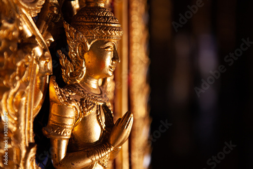 Close-up of Golden ancient thai craft art