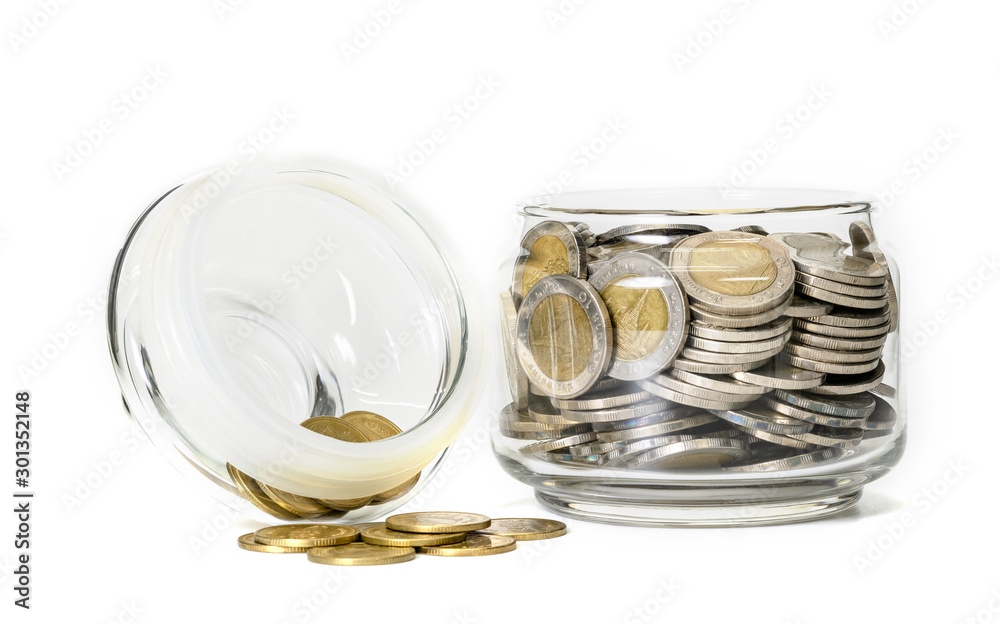 coins in glass bottle on white background,business saving and investment concept coins in glass bottle on white background,business saving and investment concept