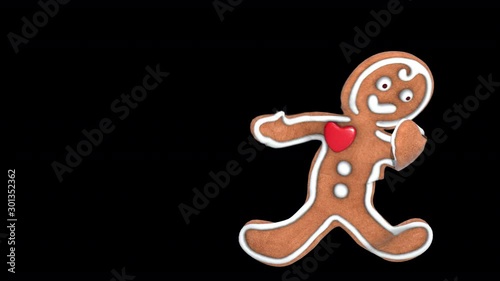 Cute Gingerbread man dancing salsa isolated with alpha channel. Seamless funny Christmas animation. photo