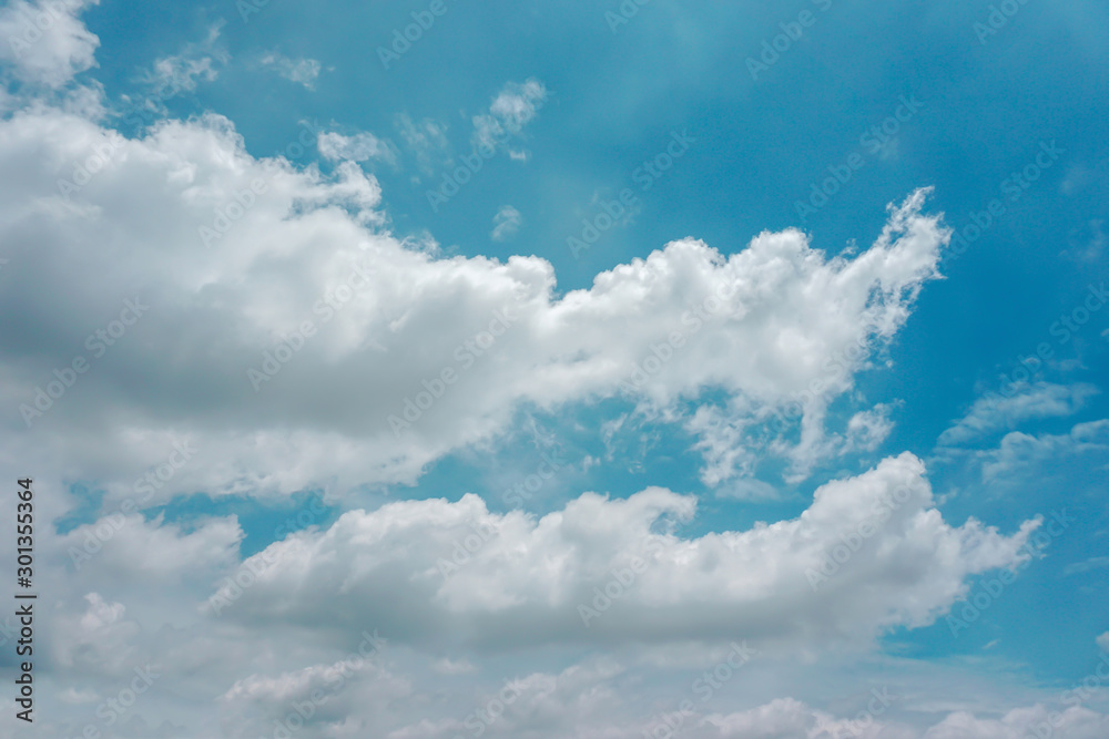 Beautiful blue sky background with clouds,Nature composition, Pure white clouds like cotton wool. Beautiful blue sky background with clouds,Nature composition, Pure white clouds like cotton wool.