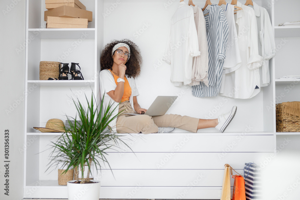 Charming young woman using notebook at home Charming young woman using notebook at home
