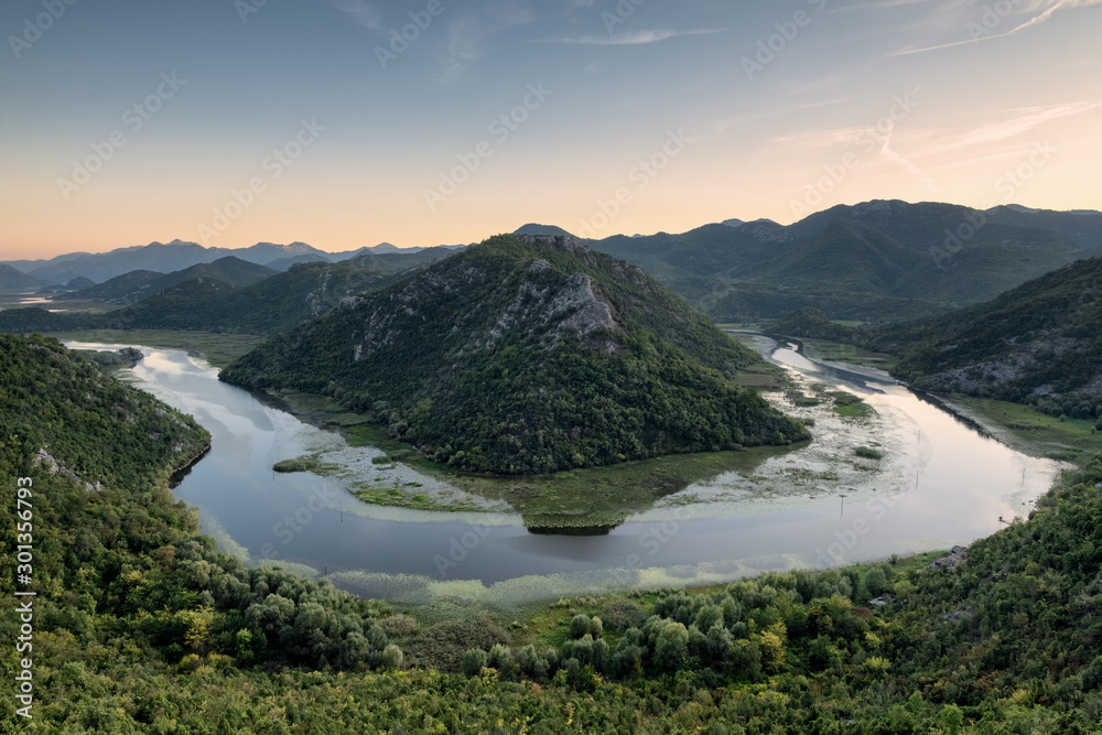 Lake Skadar bend in the river during a beautiful sunset travelling around Montenegro during the fall season