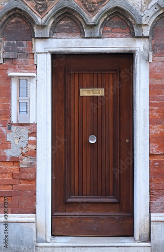 Door on brickwall facade