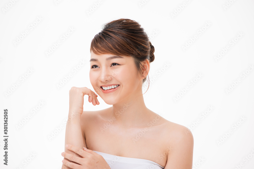 Closeup portrait of attractive asian woman with fair perfect healthy glow skin isolated on white,