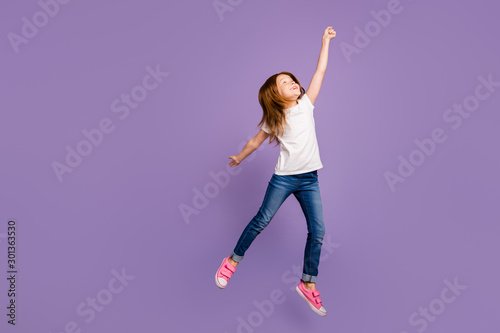 Εκτύπωση καμβά Full body profile photo of funny small ginger lady jumping high rejoicing in air