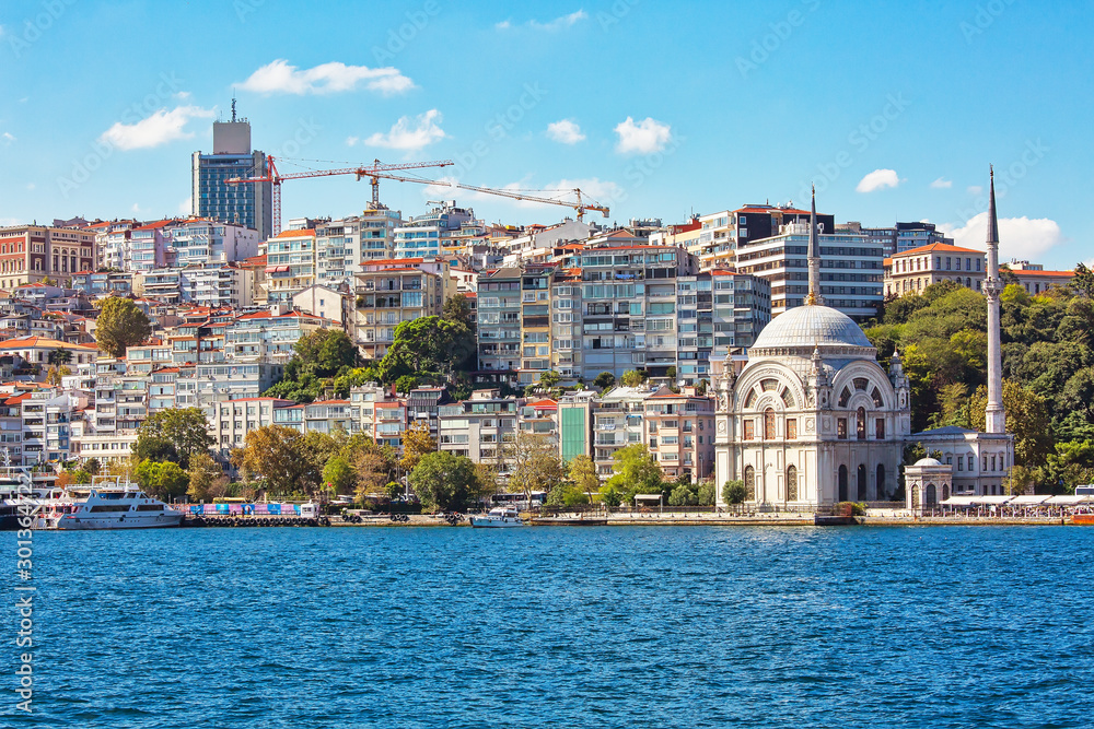 Genuine architecture along the banks of Bosphorus, popular travel destination and significant passway between Europe and Asia. Bosphorus cruise.